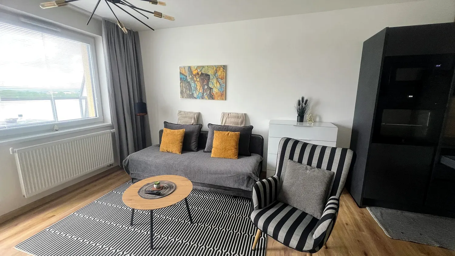Obývací pokoj, apartmán 2+kk
